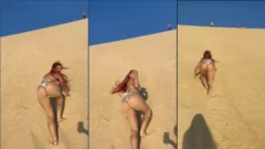 Maria Eugênia deslumbrante mientras sube lentamente las dunas y muestra su hermosa figura a sus fans