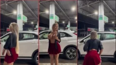 Karlyane Menezes mostrando su busto y bailando sensualmente en la estación de servicio mientras se ajusta la falda