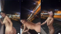 Una mujer elegante sin ropa moviendo su trasero de forma natural en el balcón