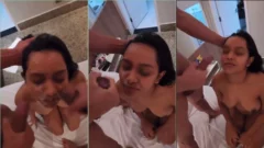 Niña que lleva un baño de placer en la cara después de la escala