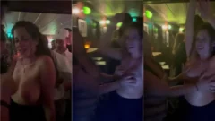 Mujer irresistible que muestra a su voluminoso más grande en la fiesta