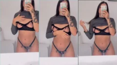 Dance delgado en el espejo con bragas diseñadas en el coño