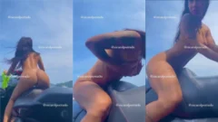 Negro de un audaz brasileño mostrando su coño en la parte superior del jet ski
